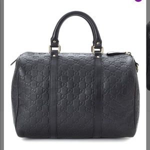 Black Gucci speedy bag